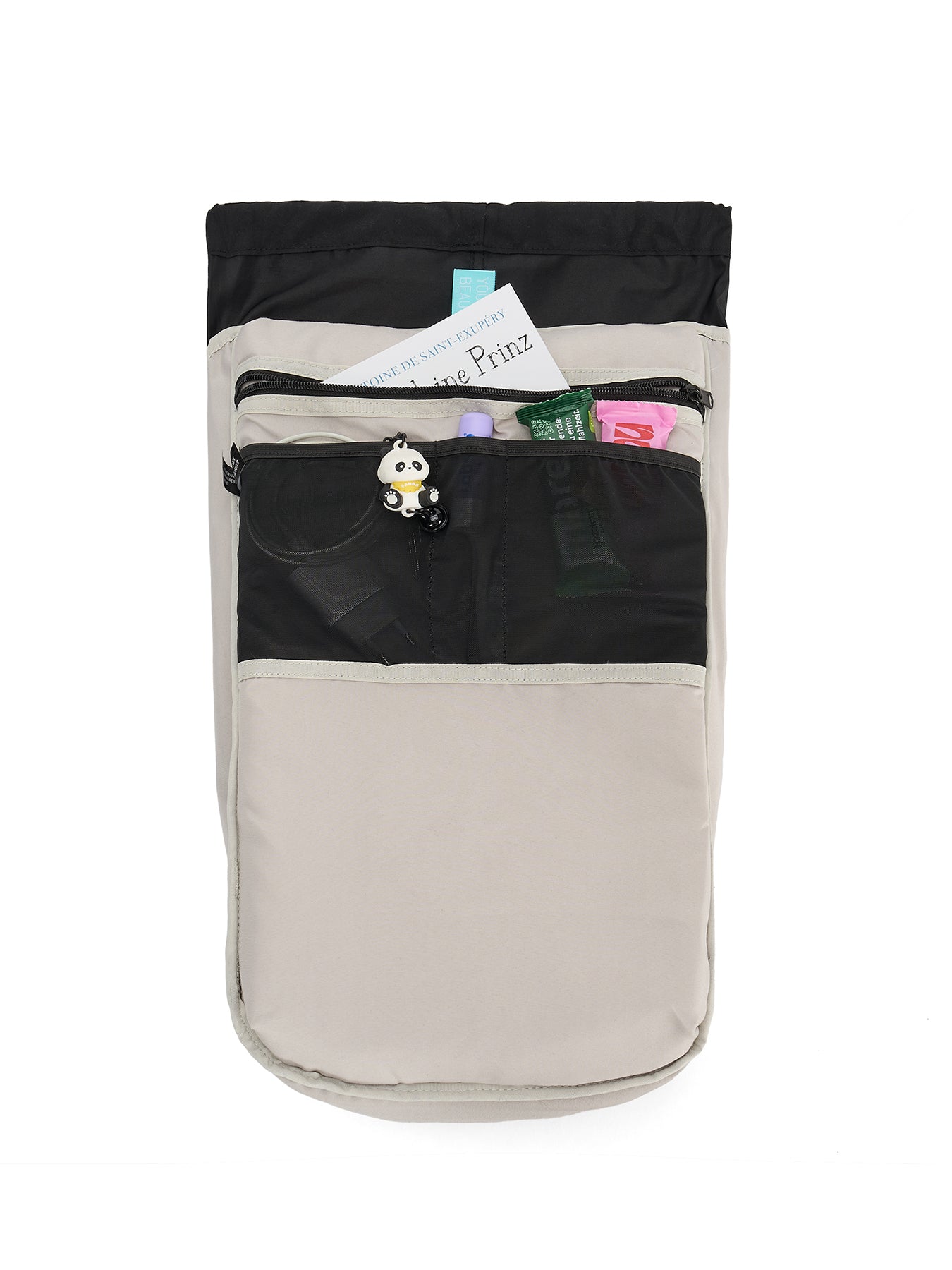 Ela Mo™ Everywhere Daypack | Embroidery Edition Upsy Daisy. Ein grauer Innenbereich des Rucksacks mit vielen kleinen Fächern