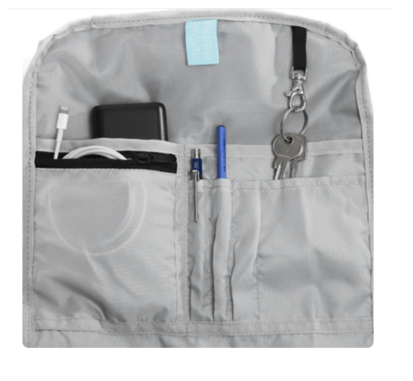 Ela Mo™ Rolltop Rucksack | Bye Bye Summer. Der graue Innenbereich des Rucksacks verfügt über mehrere kleine Fächer.