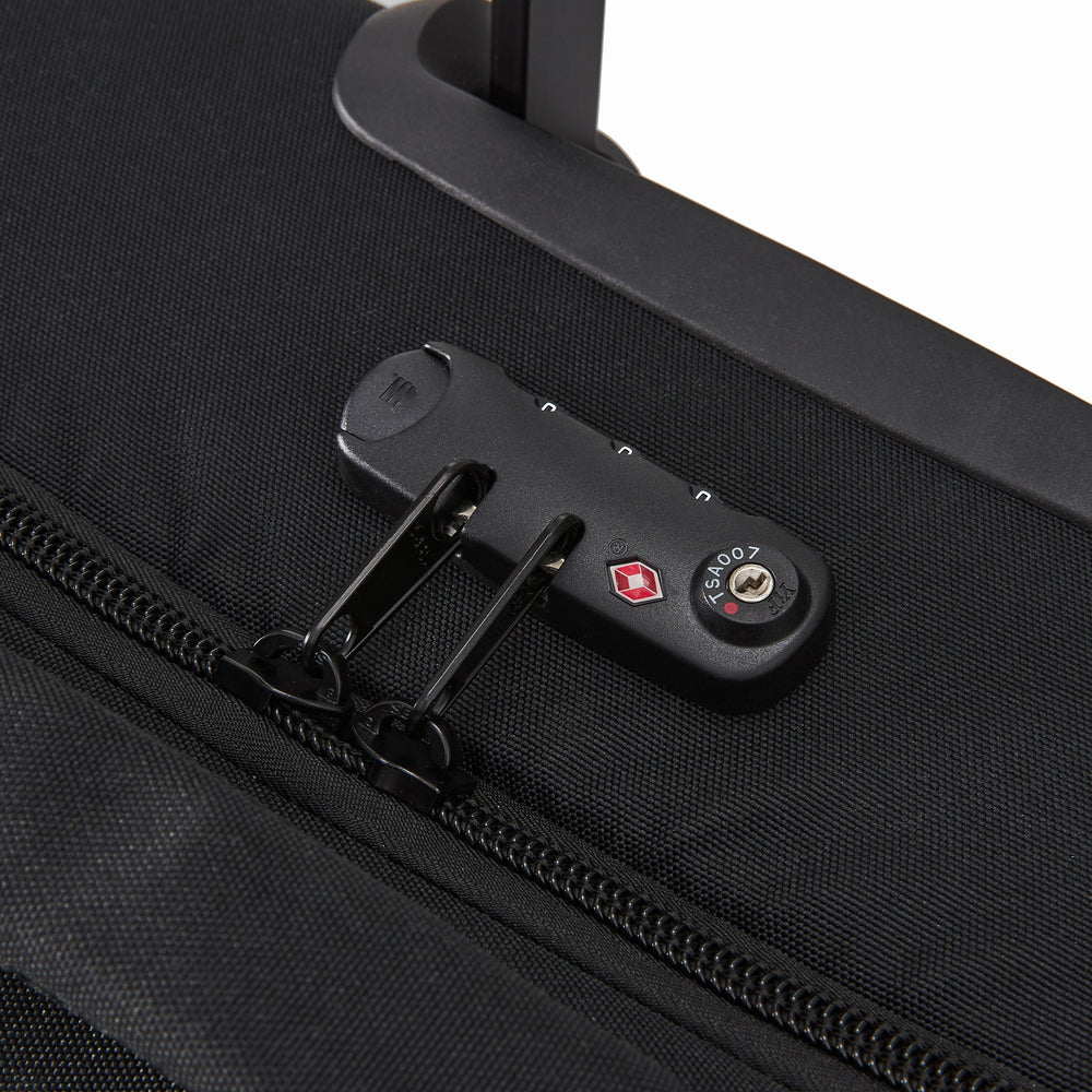 Ela Mo™ Reisetasche mit Rollen 78 Liter | Black. TSA-Schloss mit Reißverschluss an der Reisetasche.