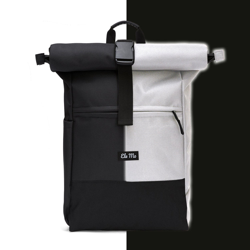 Ela Mo™ Rolltop Rucksack | Black Reflective. Schwarzer reflektierender Rucksack.