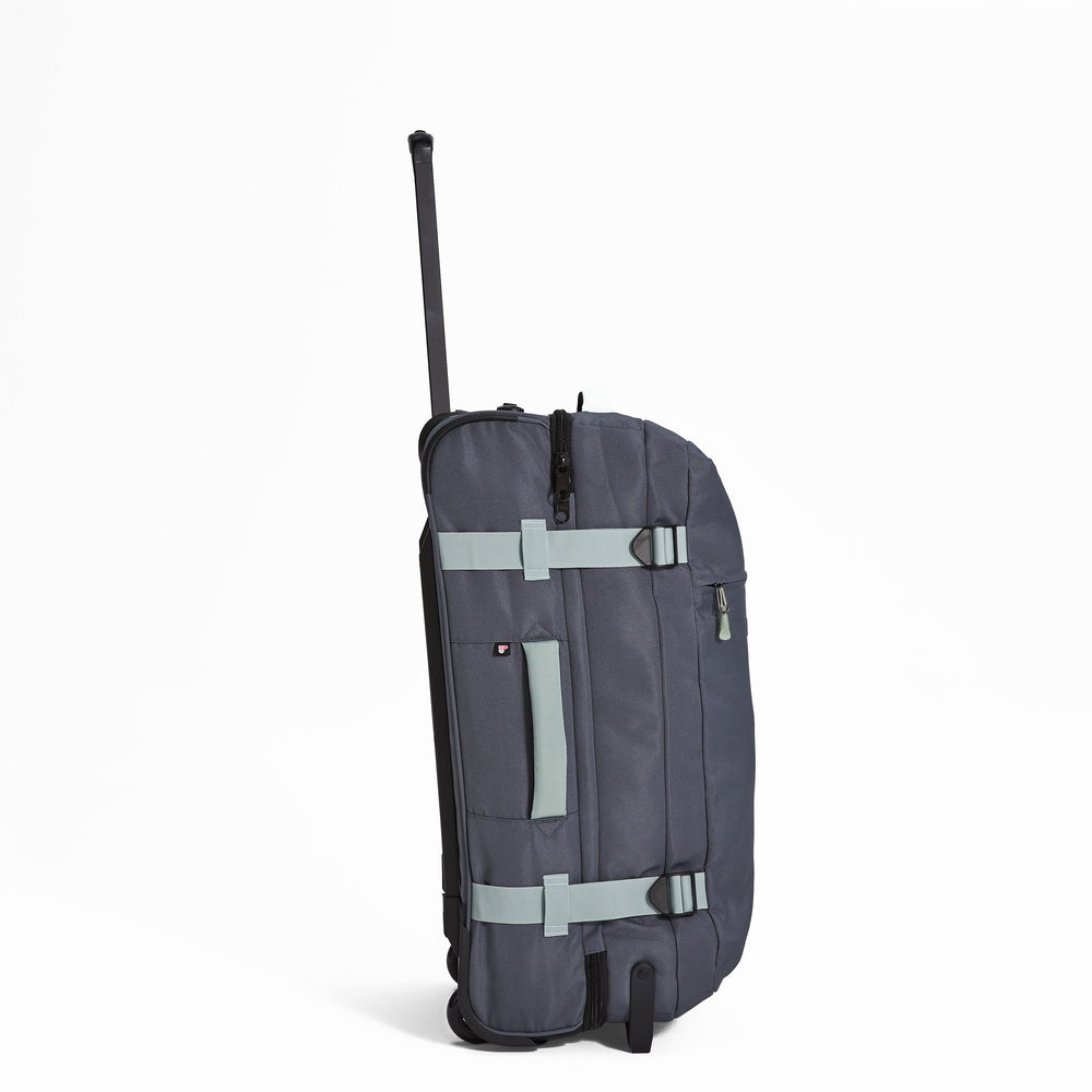 Ela Mo™ Reisetasche mit Rollen 78 Liter | Darkgrey Mint. Reisetasche mit Klickverschluss von der rechten Seite.