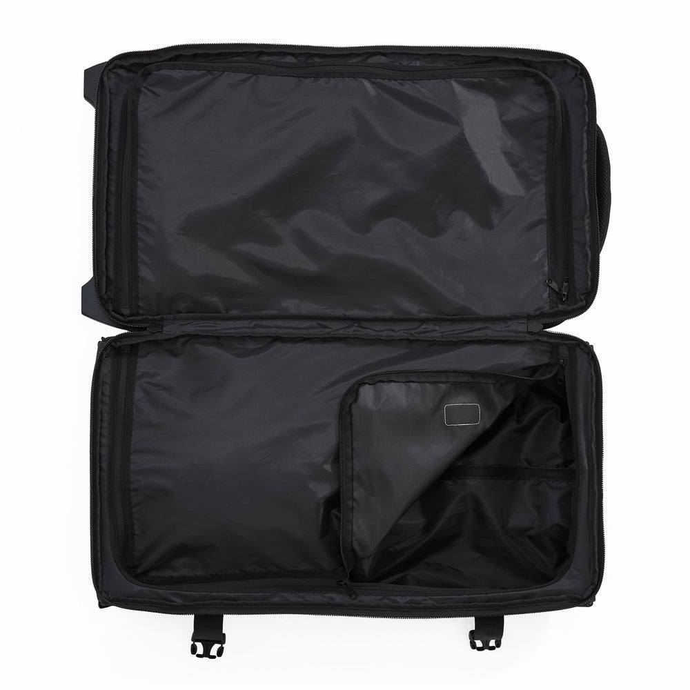 Ela Mo™ Reisetasche mit Rollen 42 Liter | Darkgrey Mint. Geöffnete Reisetasche mit sichtbarem Innenbereich und Innenfächern.